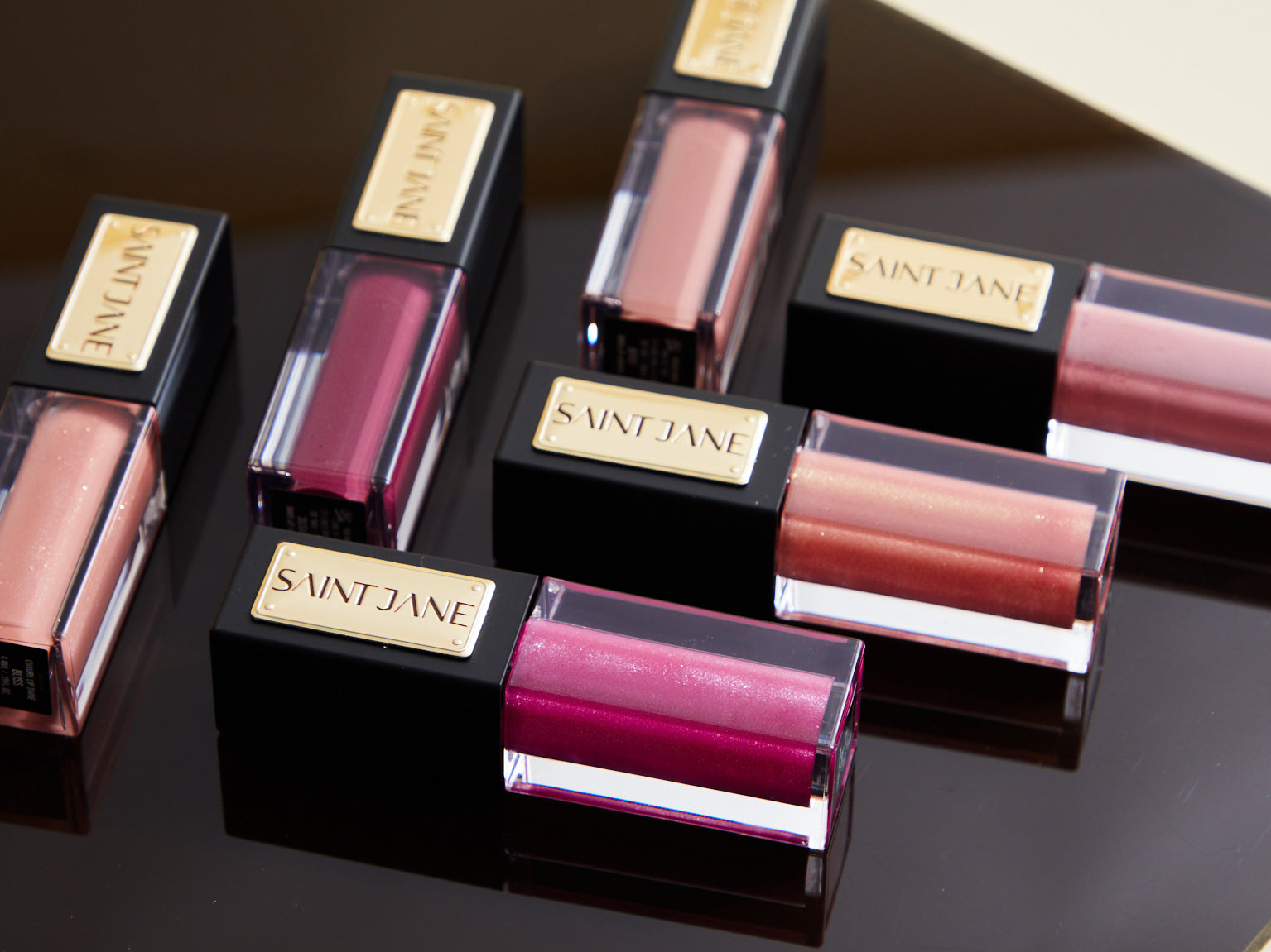 These Lip Glosses Offer the Finishing Touch You Didn't Know You Needed Saint Jane Beauty